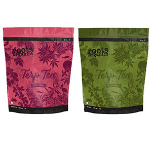 Roots Organics Terp Tea Grow (green) and Bloom (pink) fertilizer bags for hydroponic plant nutrition.