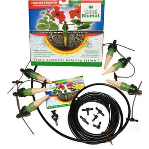 Tropf Blumat automatic watering kit featuring ceramic moisture sensors, black tubing, connectors, and instruction card.